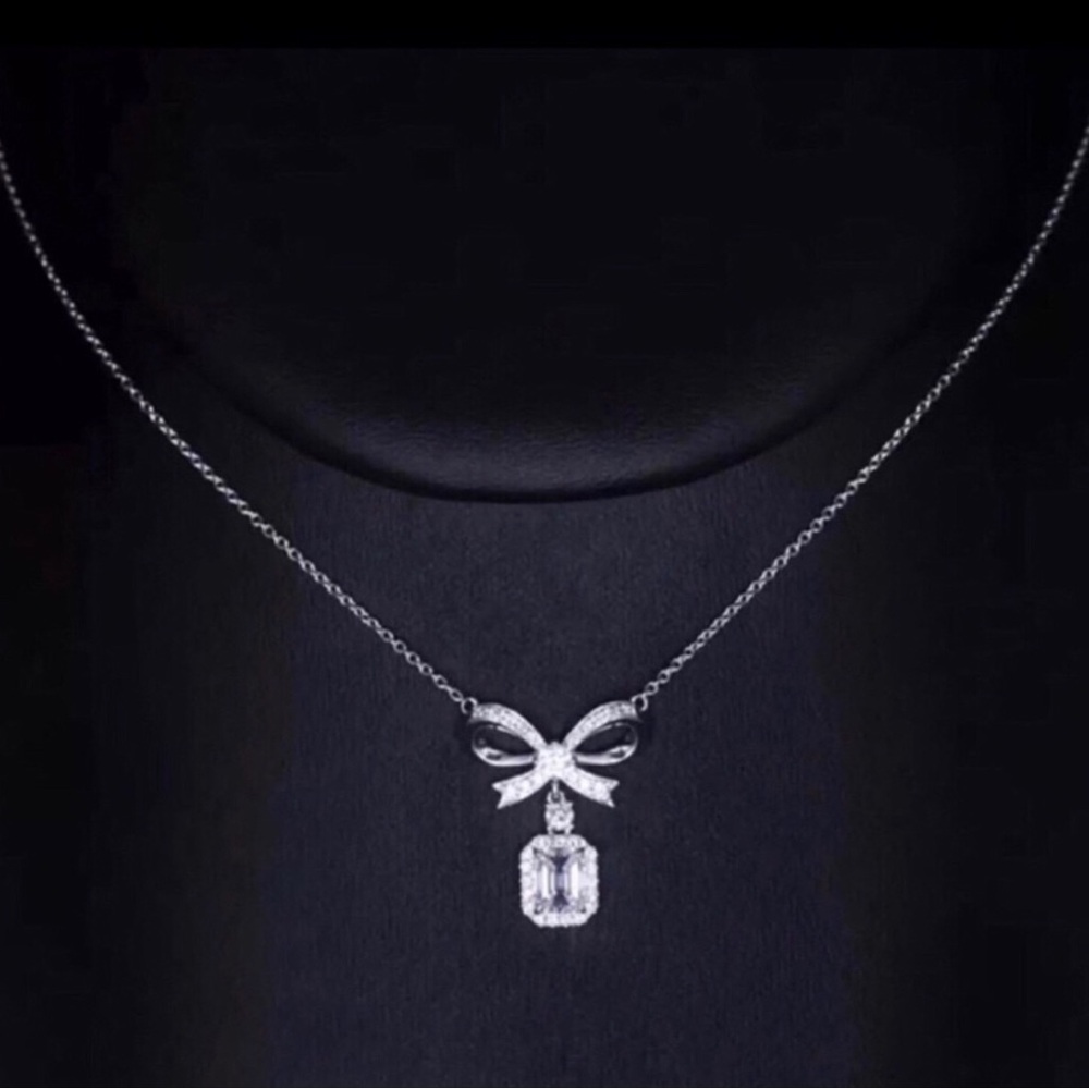 Elegant Sterling Silver Bow Pendant Necklace with Clear Crystal